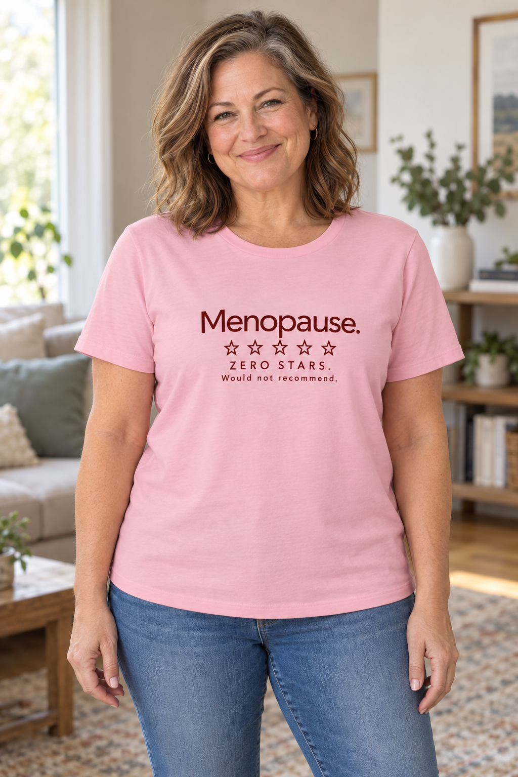 AI-generated model mockup: woman wearing Pink Menopause Zero Stars relaxed T-shirt